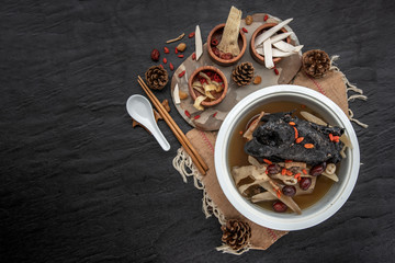 Chinese traditional nourishing health stew, stewed black bone chicken, Chinese black chicken soup,...