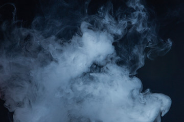 Cloud of vapor. Dark blue background