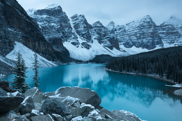 First snow Morning at Moraine Lake in Banff National Park Alberta Canada Snow-covered winter mountain lake in a winter atmosphere. Beautiful background photo