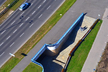 Underground pedestrian crossing through the highway. Safe road crossing.