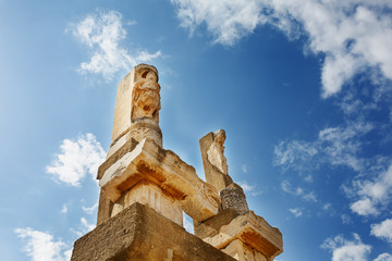 The ruins and ruins of the ancient city of Ephesus against the blue sky on a sunny day.