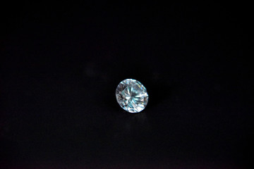 one diamond of classic shape on the black background