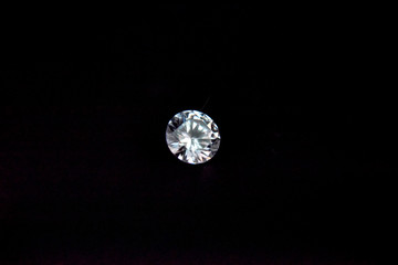 one diamond of classic shape on the black background