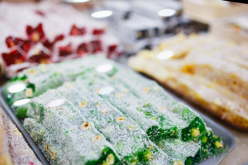 Eastern sweets, confectionery on the counter, Sherbet, Dzhezerye, halva, Turkish delight baklava.