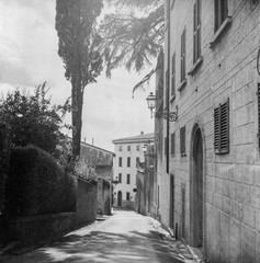 The old narrow streets in the medieval town of Massa Marittima in Tuscany shot with analogue film technique - 2