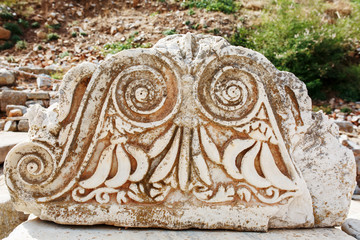 Beautiful ruins of urban architecture, graceful decoration of buildings. Parts of the ruins and ruins of ancient antiquity.