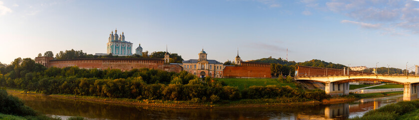Fototapeta premium The view on Smolensk, Church of the Smolensk Icon of the Mother of God or the Dnieper Gate and Dnieper river and the embankment in summer in Russia