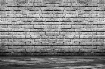 empty room with a brick wall, gray background. Studio room.
