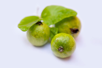 Fresh guava with leaf isolated on white background.