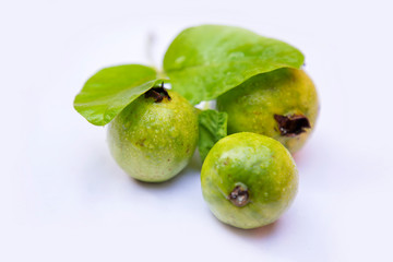 Fresh guava with leaf isolated on white background.