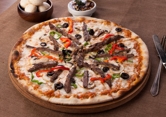 pizza with beef and vegetables