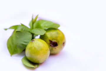 Fresh guava with leaf isolated on white background.
