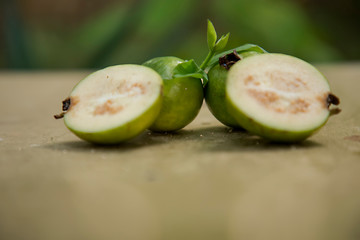guava fruit and slice on nature background. guava fruit top view on nature background.