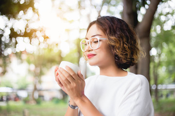 Woman enjoying fresh cooffee stock photo