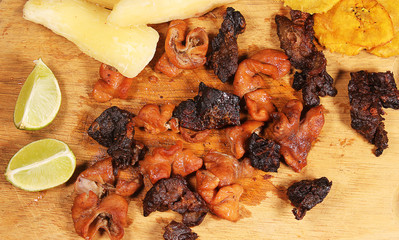typical Dominican fry, fried pork and cassava.