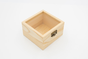 A closed wooden box with a clear glass cover isolated on white background top view