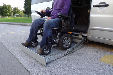 Disabled Men on Wheelchair using Accessible Vehicle with Lift