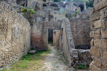 Fototapeta premium Bacoli, Naples, Italy. 20 August 2019. The ancient Roman city, with its ruins. Arches, columns and spas.