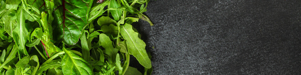 Healthy salad, leaves mix salad (mix micro greens, juicy snack). food background. copy space. Top view