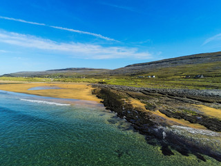 Fanore beach, County Clare, Ireland, Warm sunny day, Blue sky with white clouds, Aerial view.