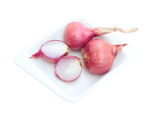 Shallot prepared before cook in plate on white background.