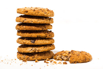 chocolate chip oatmeal cookies on white background, closeup