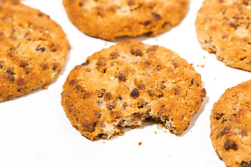 chocolate chip oatmeal cookies on white background. conceptual photo, closeup