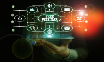 Conceptual hand writing showing Free Webinar. Concept meaning Lecture Workshop Seminar that is...