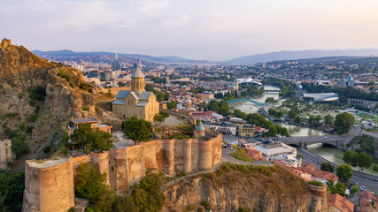 Beautiful aerial and panoramic view of Tbilisi at sunset, Georgia, Europe © Marcus