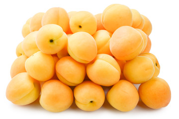 Ripe juicy orange apricots isolated on white background.