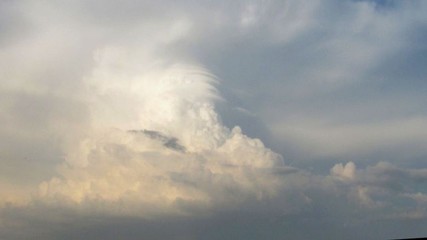 Naklejka na ściany i meble distance view of a thundercloud above the sea