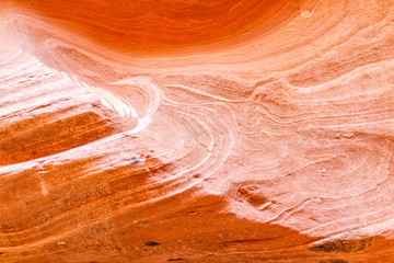 Orange sandstone abstract closeup of rock formations at Antelope slot canyon in Arizona on trail...