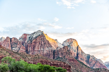 Zion National Park in Utah with landscape view of sunrise sky at red rock cliffs near Watchman Campground and Visitor Center