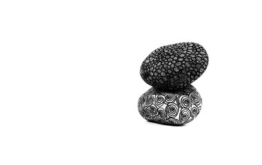 Photo of decorated rocks on a white seamless background 5