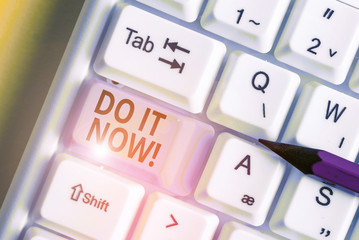 Conceptual hand writing showing Do It Now. Concept meaning not hesitate and start working or doing...