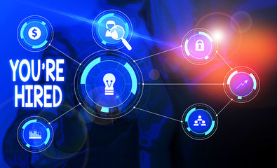 Text sign showing You Re Hired. Business photo showcasing New Job Employed Newbie Enlisted Accepted Recruited Woman wear formal work suit presenting presentation using smart device