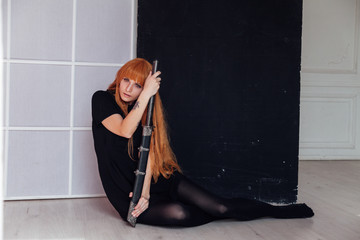 Girl cosplayer with red hair anime Japan