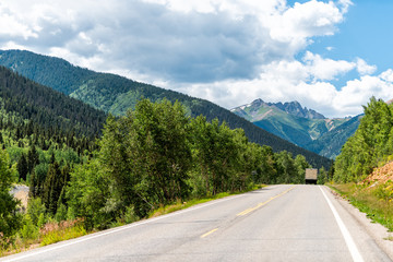 Fototapeta na wymiar Truck on scenic road in Colorado on Million Dollar Highway 550 with mountain peak view in summer to Silverton