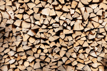 Pile of wood for the stove or fireplace. For background use.