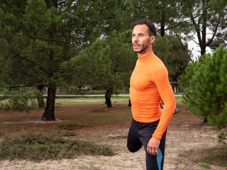 close-up of a man about to start running