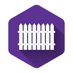 White Fence wooden icon isolated with long shadow. Garden fence sign. Purple hexagon button. Vector Illustration