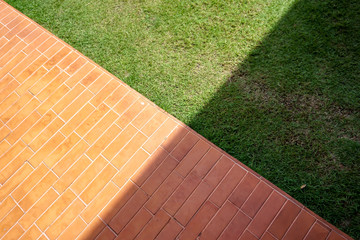 Red brick floor and grass