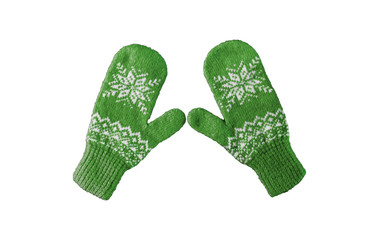 pair of green knitted mittens with christmas pattern isolated on