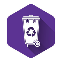 White Recycle bin with recycle symbol icon isolated with long shadow. Trash can icon. Garbage bin sign. Recycle basket icon. Purple hexagon button. Vector Illustration