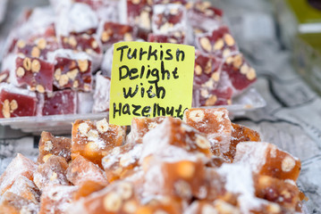 Turkish delight with hazelnut. Arabic sweets in the market.