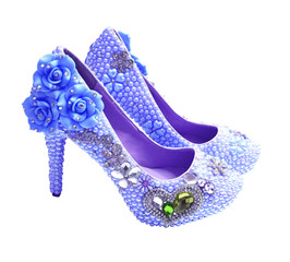 beautiful expensive wedding shoes in pearls and rhinestones with flowers