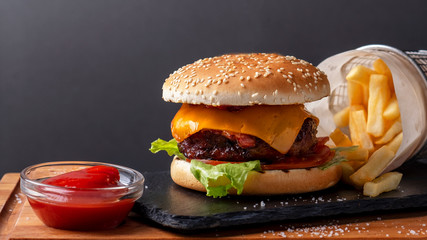 Homemade beef burger with french fries and ketchup. Fastfood