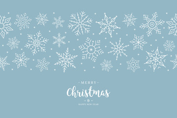 Christmas snowflake elements border card with greeting text seamless pattern ice blue background.