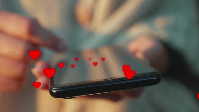 Woman hand browse or create popular content on smartphone screen, likes pouring as flowing red hearts icons. Viral trends concept - close up