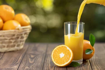 Rugzak orange juice pouring in glass © alter_photo